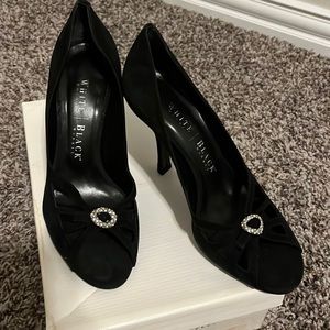 New White House Black Market black suede heals with rhinestone accent. Size 7.